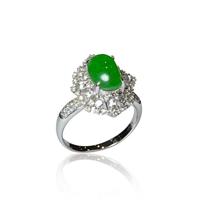 OLIVE JADEITE CABOCHON RING IN 18K WHITE GOLD AND DIAMONDS